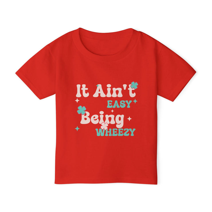 Vibrant Toddler T-Shirt with Fun Design - It Ain't Easy Being Wheezy, Cute Kids Tee, Playful Shirt for Toddlers, Birthday Gift, [...] - Bold PrintVibrant Toddler T-Shirt with Fun Design - It Ain't Easy Being Wheezy, Cute Kids Tee, Playful Shirt for Toddlers, Birthday Gift, [...]Kids clothesVibrant Toddler T-Shirt with Fun Design - It Ain't Easy Being Wheezy, Cute Kids Tee, Playful Shirt for Toddlers, Birthday Gift, [...]