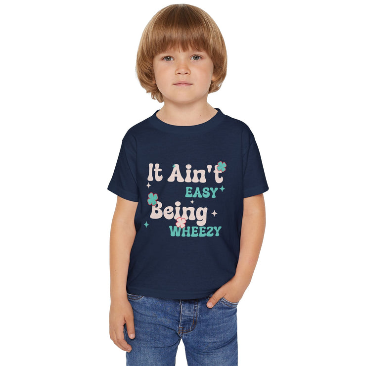Vibrant Toddler T-Shirt with Fun Design - It Ain't Easy Being Wheezy, Cute Kids Tee, Playful Shirt for Toddlers, Birthday Gift, [...] - Bold PrintVibrant Toddler T-Shirt with Fun Design - It Ain't Easy Being Wheezy, Cute Kids Tee, Playful Shirt for Toddlers, Birthday Gift, [...]Kids clothesVibrant Toddler T-Shirt with Fun Design - It Ain't Easy Being Wheezy, Cute Kids Tee, Playful Shirt for Toddlers, Birthday Gift, [...]