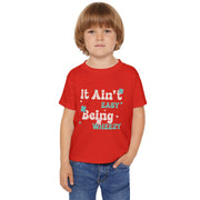 Vibrant Toddler T-Shirt with Fun Design - It Ain't Easy Being Wheezy, Cute Kids Tee, Playful Shirt for Toddlers, Birthday Gift, [...] - Bold PrintVibrant Toddler T-Shirt with Fun Design - It Ain't Easy Being Wheezy, Cute Kids Tee, Playful Shirt for Toddlers, Birthday Gift, [...]Kids clothesVibrant Toddler T-Shirt with Fun Design - It Ain't Easy Being Wheezy, Cute Kids Tee, Playful Shirt for Toddlers, Birthday Gift, [...]