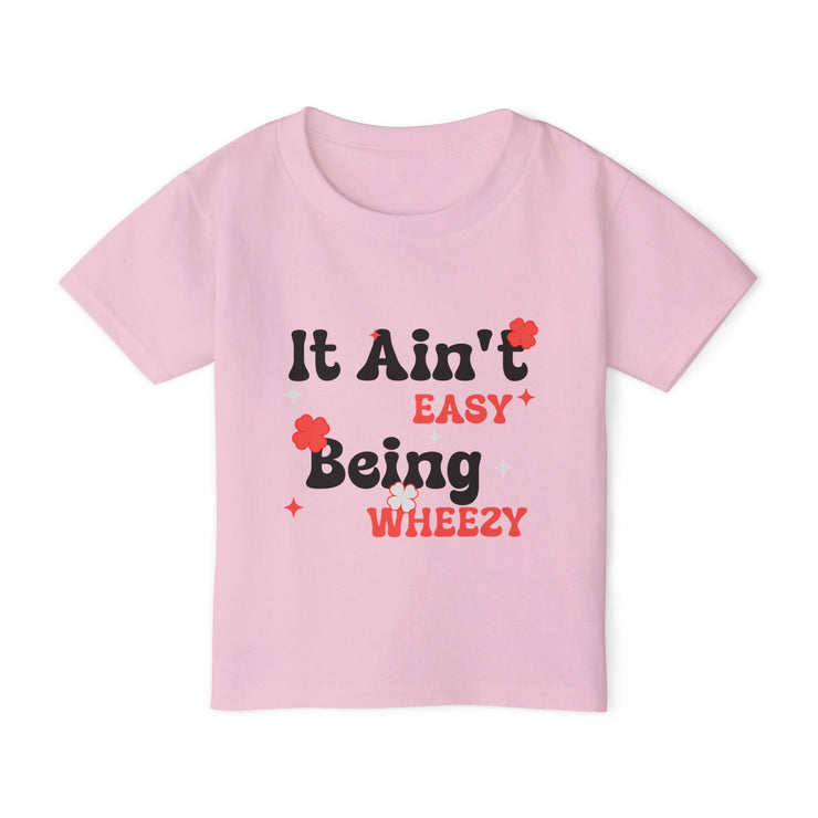 Vibrant Toddler T-Shirt with Fun Design - It Ain't Easy Being Wheezy, Cute Kids Tee, Playful Shirt for Toddlers, Birthday Gift, [...] - Bold PrintVibrant Toddler T-Shirt with Fun Design - It Ain't Easy Being Wheezy, Cute Kids Tee, Playful Shirt for Toddlers, Birthday Gift, [...]Kids clothesVibrant Toddler T-Shirt with Fun Design - It Ain't Easy Being Wheezy, Cute Kids Tee, Playful Shirt for Toddlers, Birthday Gift, [...]
