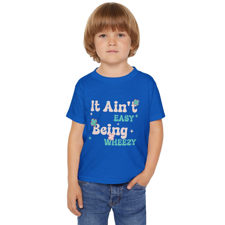 Vibrant Toddler T-Shirt with Fun Design - It Ain't Easy Being Wheezy, Cute Kids Tee, Playful Shirt for Toddlers, Birthday Gift, [...] - Bold PrintVibrant Toddler T-Shirt with Fun Design - It Ain't Easy Being Wheezy, Cute Kids Tee, Playful Shirt for Toddlers, Birthday Gift, [...]Kids clothesVibrant Toddler T-Shirt with Fun Design - It Ain't Easy Being Wheezy, Cute Kids Tee, Playful Shirt for Toddlers, Birthday Gift, [...]