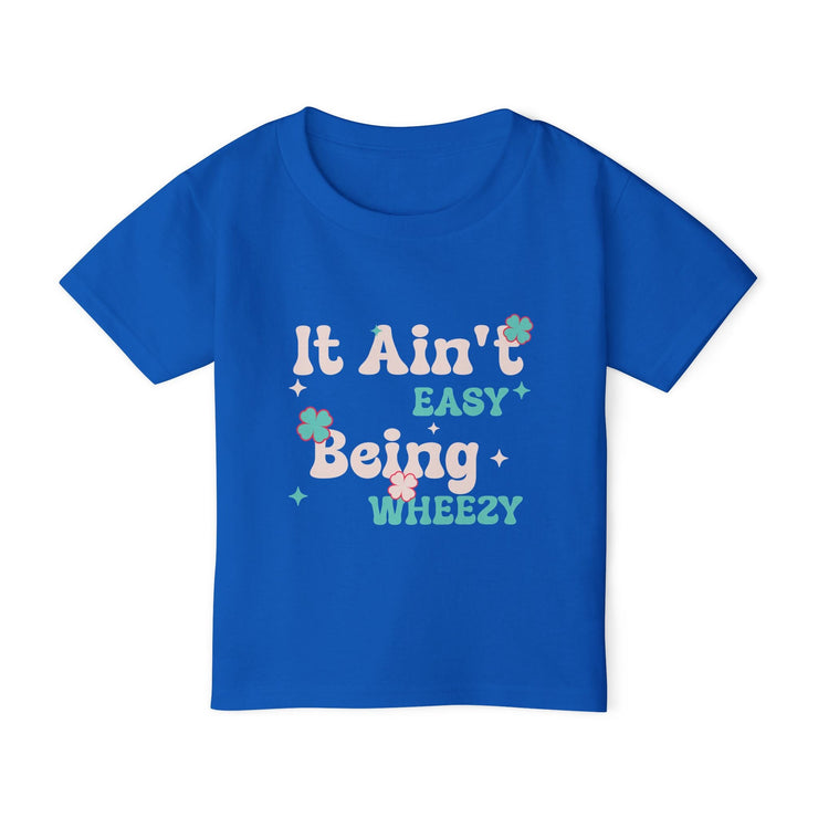 Vibrant Toddler T-Shirt with Fun Design - It Ain't Easy Being Wheezy, Cute Kids Tee, Playful Shirt for Toddlers, Birthday Gift, [...] - Bold PrintVibrant Toddler T-Shirt with Fun Design - It Ain't Easy Being Wheezy, Cute Kids Tee, Playful Shirt for Toddlers, Birthday Gift, [...]Kids clothesVibrant Toddler T-Shirt with Fun Design - It Ain't Easy Being Wheezy, Cute Kids Tee, Playful Shirt for Toddlers, Birthday Gift, [...]
